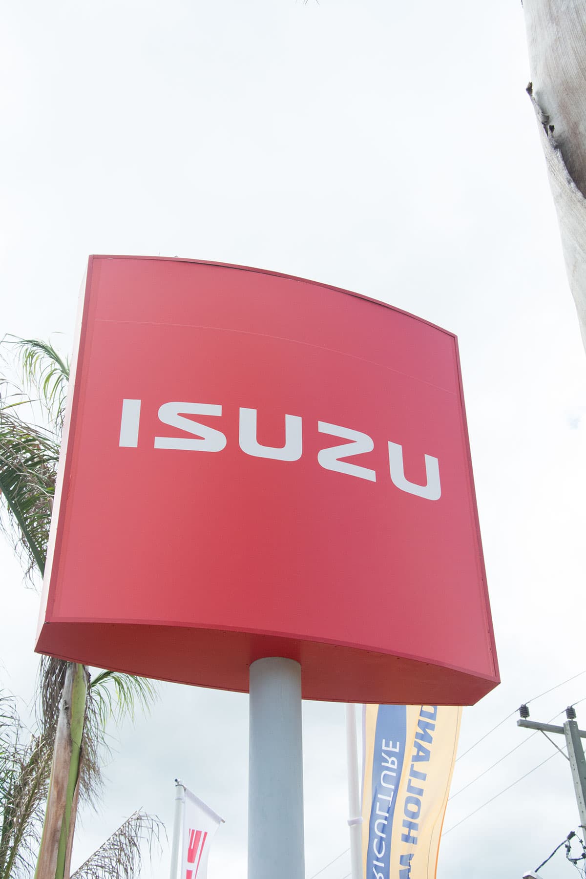 ISUZU logo sign